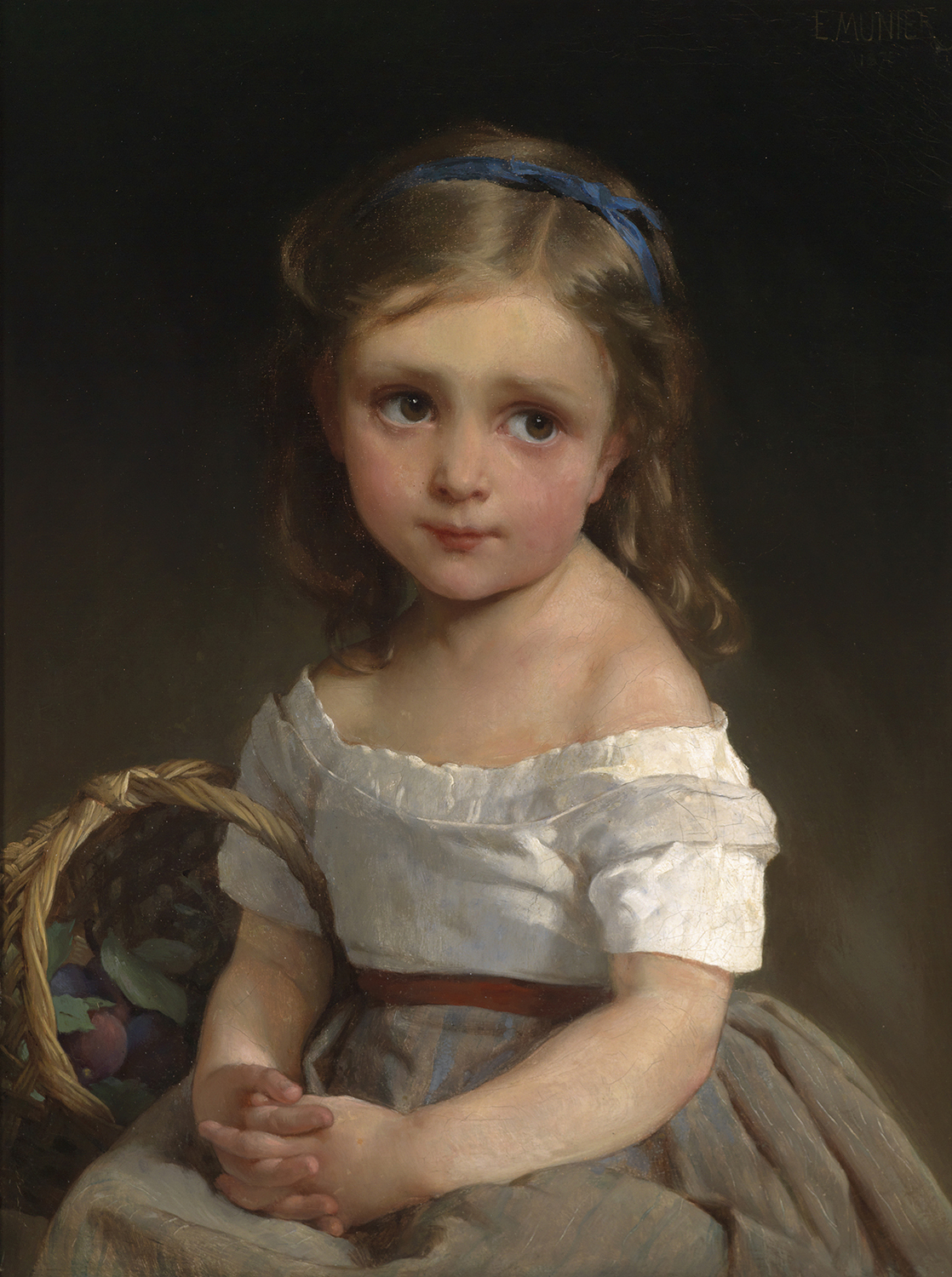 A young girl with a basket of plums on her arm