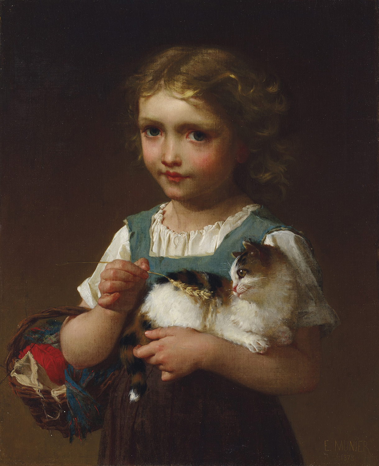 A young girl with a cat