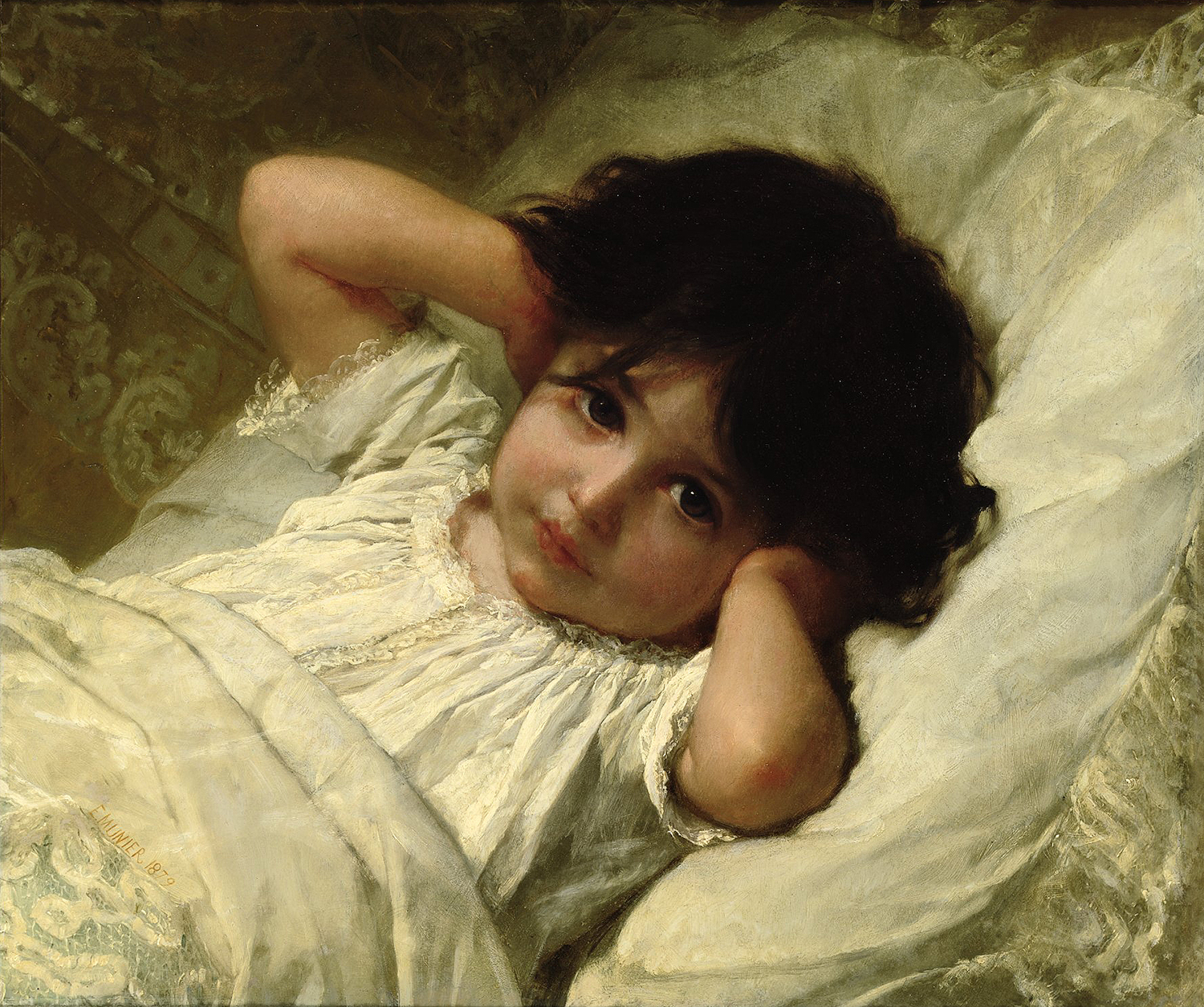 a young girl with dark hair in bed