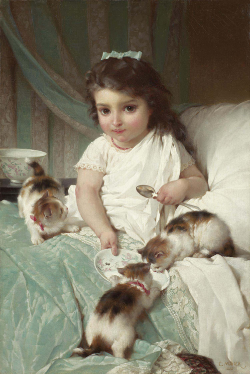 girl in bed with 3 kittens