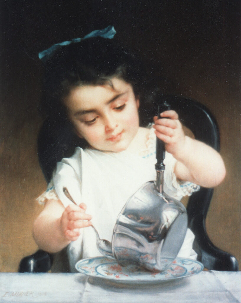 Young child at a table with a pot