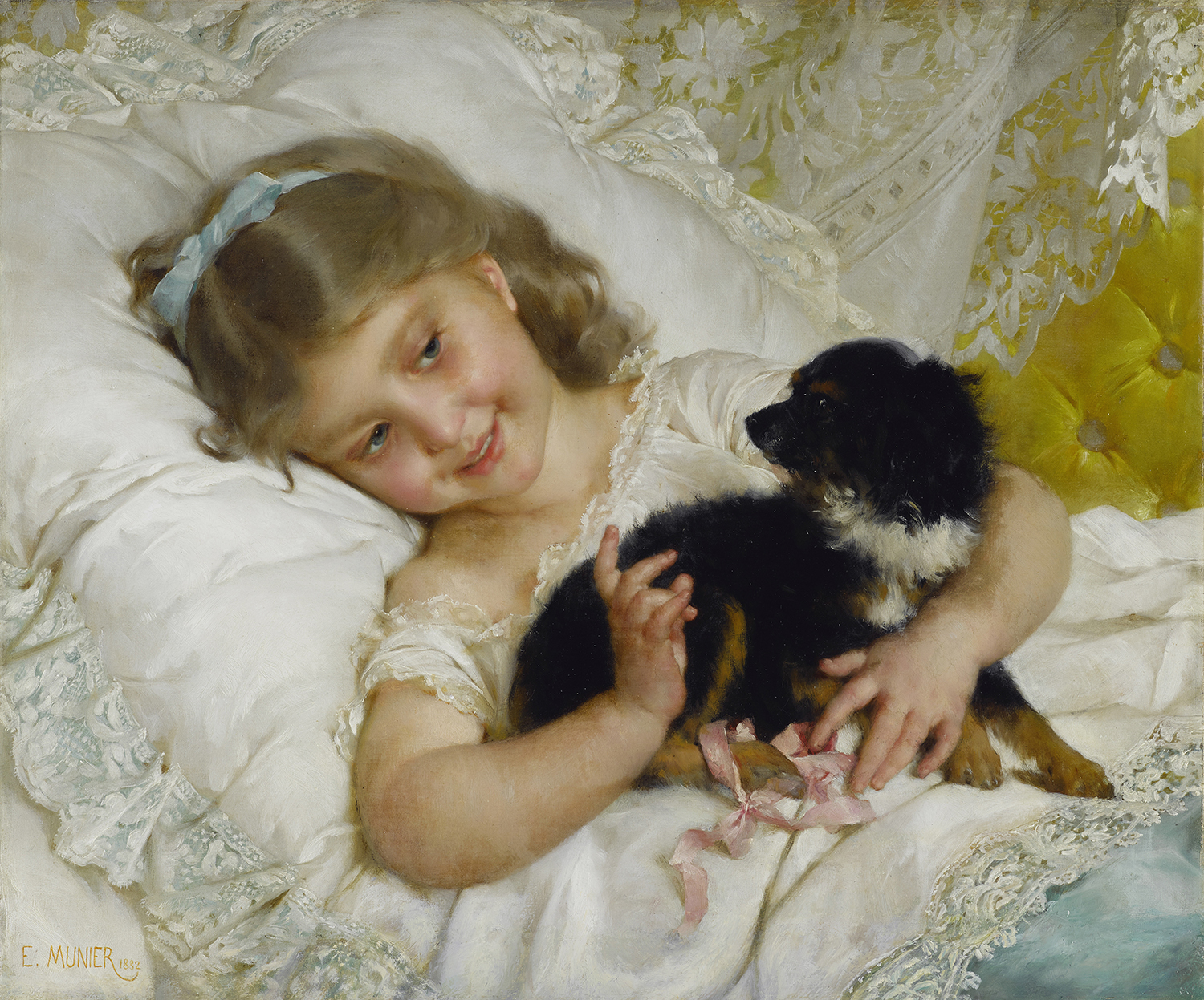 Young girl in bed with a black dog