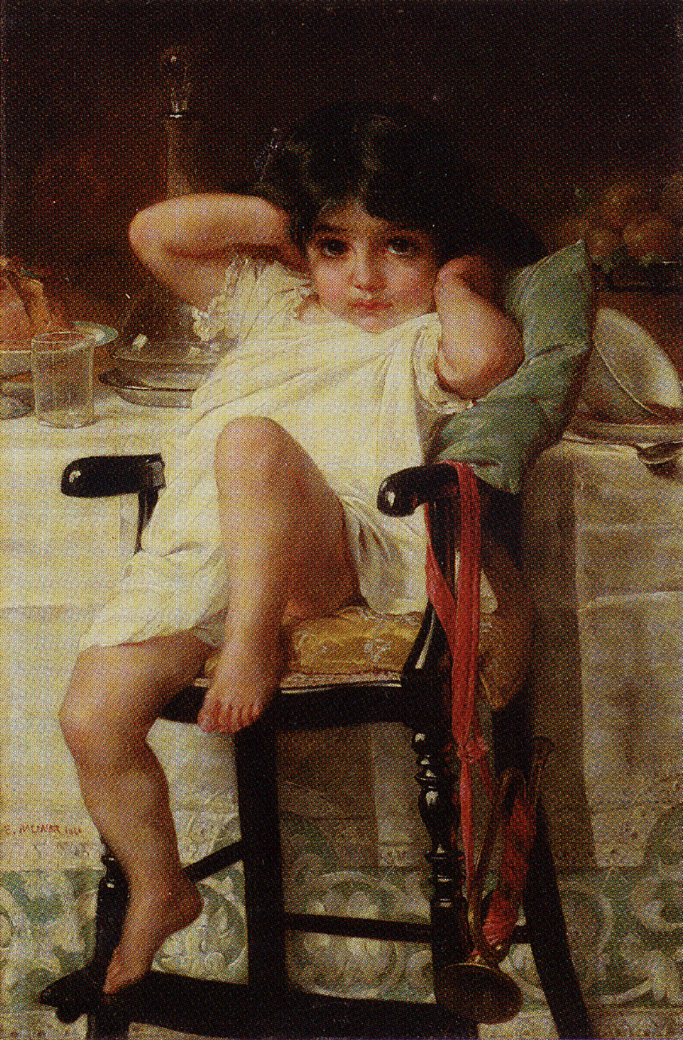 young girl seated at a table