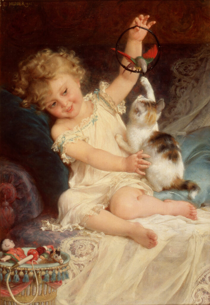 young girl playing with her cat
